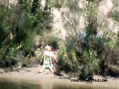 Hot spy video featuring one couple making love in the bushes