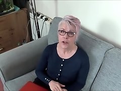 Short haired blonde granny Lady Sextacy strokes a cock with her feet