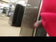 Flashing cock in clothes store