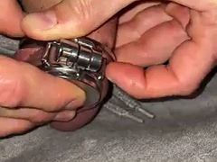 Flat chastity cage close up with urethral plug play