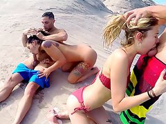 Cock hungry pornstars enjoy having group sex during vacation
