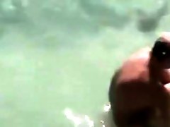 Voyeur doggystyle sex with couple in the ocean
